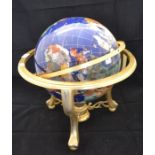A Chinese varied marble style and mother of pearl mounted globe, gilt metal mount