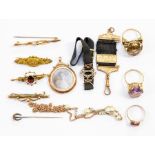 A collection of 9ct gold items including brooches, chains, bracelets etc, gem-set rings, approx