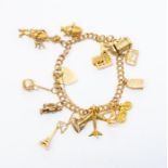 A 9ct yellow gold charm bracelet, approx 44 grams