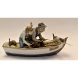 A Lladro group study "Paloma" grandfather, grandson and the dog fishing from a rowing boat, no 5215