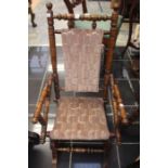 An early 20th Century oak turned American child's rocking chair.