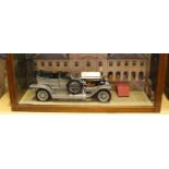 Franklin Mint Rolls Royce Silver Ghost in display case.