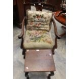 A George III mahogany library chair, circa 1820,on the front two supports cabriole legs with claw