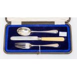A cased solid silver christening set, knife with a bone handle, all pieces hallmarked to the back,