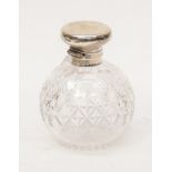 A cut glass cologne bottle with silver top, fitted stopper, Birmingham 1912, 9cm diam