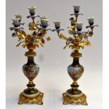 A pair of modern reproduction 5 branch porcelain and gilt metal candelabras Condition: The porcelain