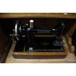A table top circa late 19th Century / early 20th Century Singer Sewing Machine