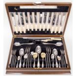 A cased six place canteen of Viners cutlery including carving set and gilt bowl fruit spoons, tea