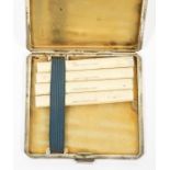 A pair of Birmingham silver cigarette cases - both with monograms and engine turned.