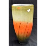 A large Svaga glass vase, brown rising through orange to pale green with linear decoration.