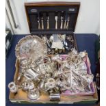 A collection of silver plate items to include candelabras, trays, tea wares, flatware and a cased
