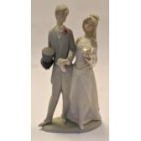 A Lladro matt glaze bride and groom figurative group, no 1404