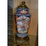 An early 19th Century imari vase, possible Chinese, ormolu mounted, converted to a lamp