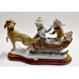 A large Lladro group, a dog sleigh with a girl and boy on board with plinth. Condition: Dogs leg