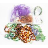 A collection of precious and semi precious gem stone beads, to include a tanzanite and morganite