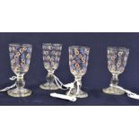 Four dessert wine glasses circa early 19th Century decorated with enamelling in flower form