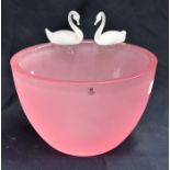 A Mats Jonasson pink overlay glass bowl with two frosted swans