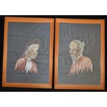 A pair of Oriental silk embroidered portraits of a man and woman, three dimensional, in relief,