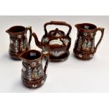 Group of early 20th century Measham glazed pottery barge ware, including Tea Pot, stand, 3 jugs (