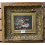 A Still life of fruit and floral painted on porcelain, framed frame 37 x 34.5 cms picture 22 x 18