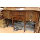 A Georgian style mahogany dining sideboard, two tier drawers and two cupboards, early 20th