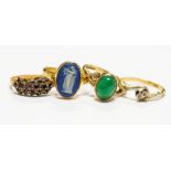 A collection of four gold rings, to include a 15ct gold and paste set ring circa 1859, a/f some