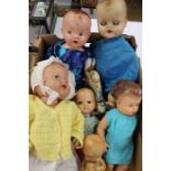 Six dolls and rabbit finger puppet