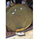 A Middle Eastern circular tray top for a table, plus an iron (2)