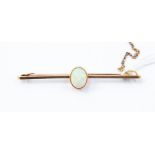 A 15ct gold and opal bar brooch, total gross weight approx 4.6gms