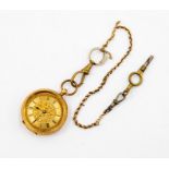 An 18k gold ladies fob watch, La Mignonne, approx 3cm diam approx 30.8gms, with key and gilt chain
