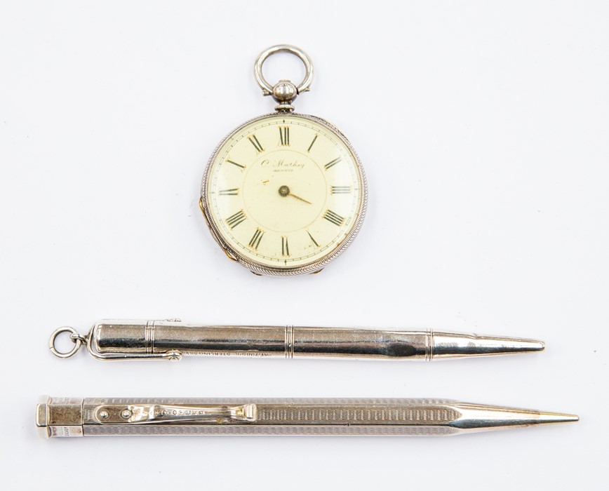 A silver fob watch, C. Mathey Geneve, 3.5cm diam; two silver propelling pencils (3)