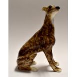 A Jenny Winstanley studio pottery model of a brindle greyhound/whipper, size 5.