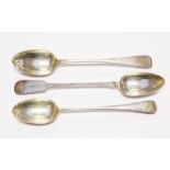 Two silver Victorian serving spoons and one Edwardian serving spoon, two Sheffield, one Newcastle,