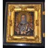 A possibly Russian early 19th Century icon with gilt metal, white metal decoration around Jesus