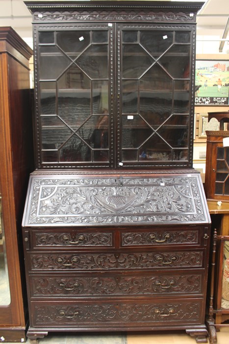 A19th Century carved mahogany book case.