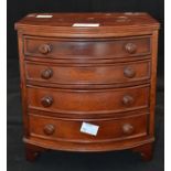 A miniature circa 20th Century mahogany chest of drawers