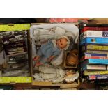 A collection of assorted to include: Jigsaw puzzles; plated cutlery; dolls and teddy (3 boxes) and a