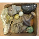 A collection of various items including an onyx ashtray, eggs, soapstone figures and art pottery