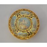 A late 18th Century Continental tortoiseshell and gilt mounted circular snuff box and cover, the
