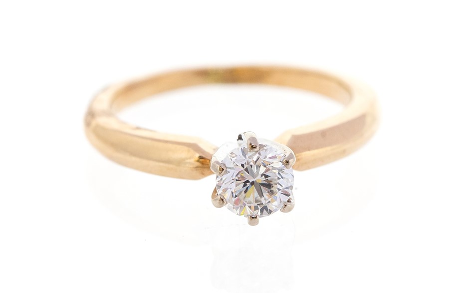 A diamond and 18ct gold solitaire ring, diamond weighing approx. 0.50ct, assessed clarity VS,