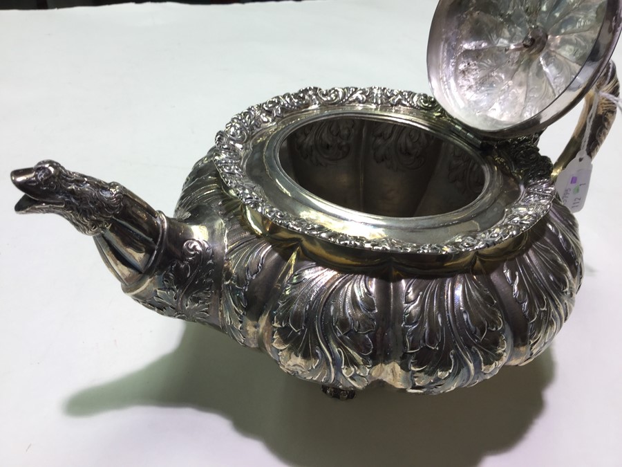 A George IV melon shaped silver teapot, the body with fluted section profusely chased with - Image 3 of 8
