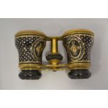 A pair of 19th Century French tortoiseshell and gilt pique work Opera glasses retailed by Ducatillon