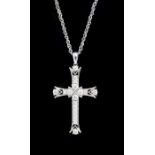 A diamond and 18ct white gold cruciform pendant, comprising eighteen claw set round brilliant-cut