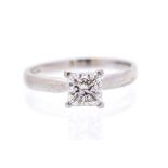A diamond solitaire ring, the claw square modified brilliant cut diamond  weighing approx. 1.02ct,