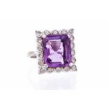 An amethyst and diamond 18ct gold square ring, comprising a square cut amethyst with a brilliant cut