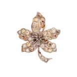 A diamond and gold leaf brooch, set with graduated champagne, cognac and cinnamon coloured diamonds,