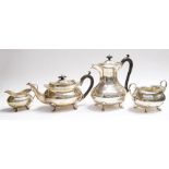A George V four piece silver tea service, plain bodies on scroll & hoof feet, by Joseph Gloster Ltd,