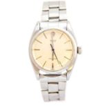 Rolex- A gentleman's Rolex Oyster Precision steel bracelet watch, round cream dial applied batons,