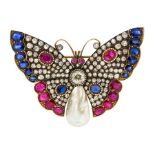 An Edwardian diamond, ruby, sapphire and blister pearl butterfly brooch, the central round old cut