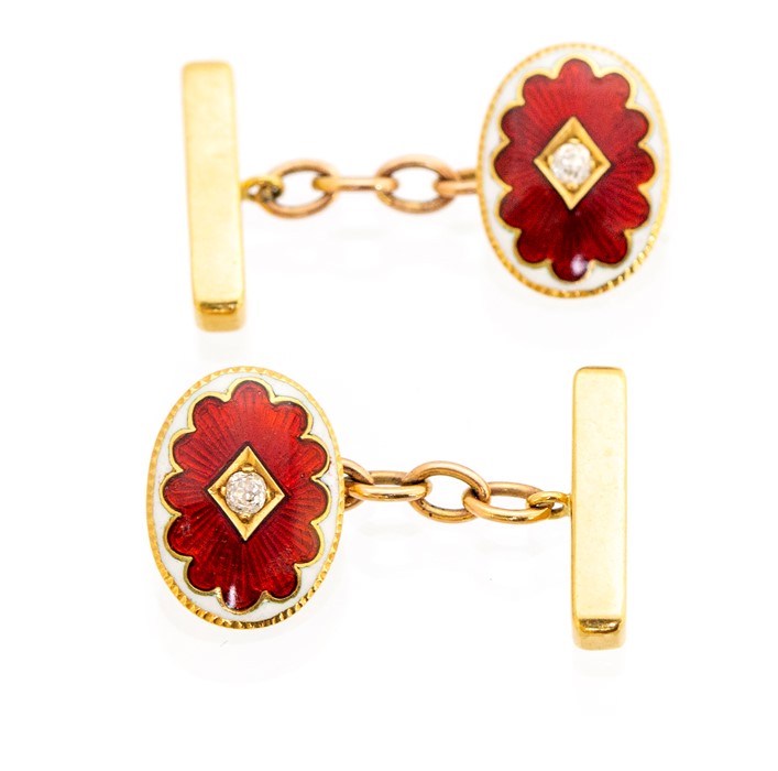 A pair of 18ct gold and enamel cufflinks, comprising oval forms decorated with red guilloche